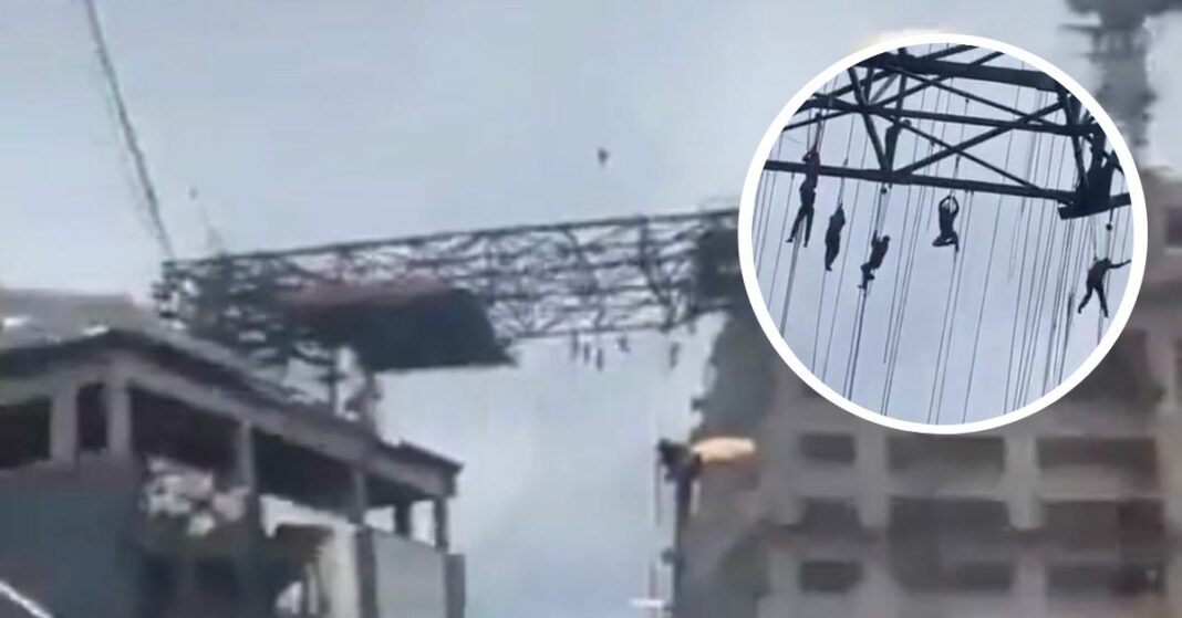 obreros colgando suspendidos en el aire brasil 140 metros de altura
